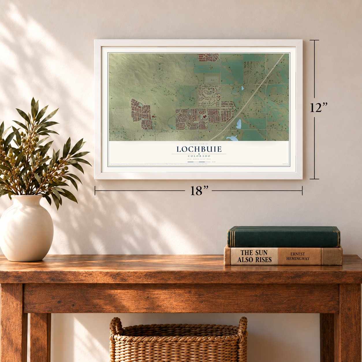 Lochbuie, Colorado map, 12 x 18 inch print in a white frame in an entryway