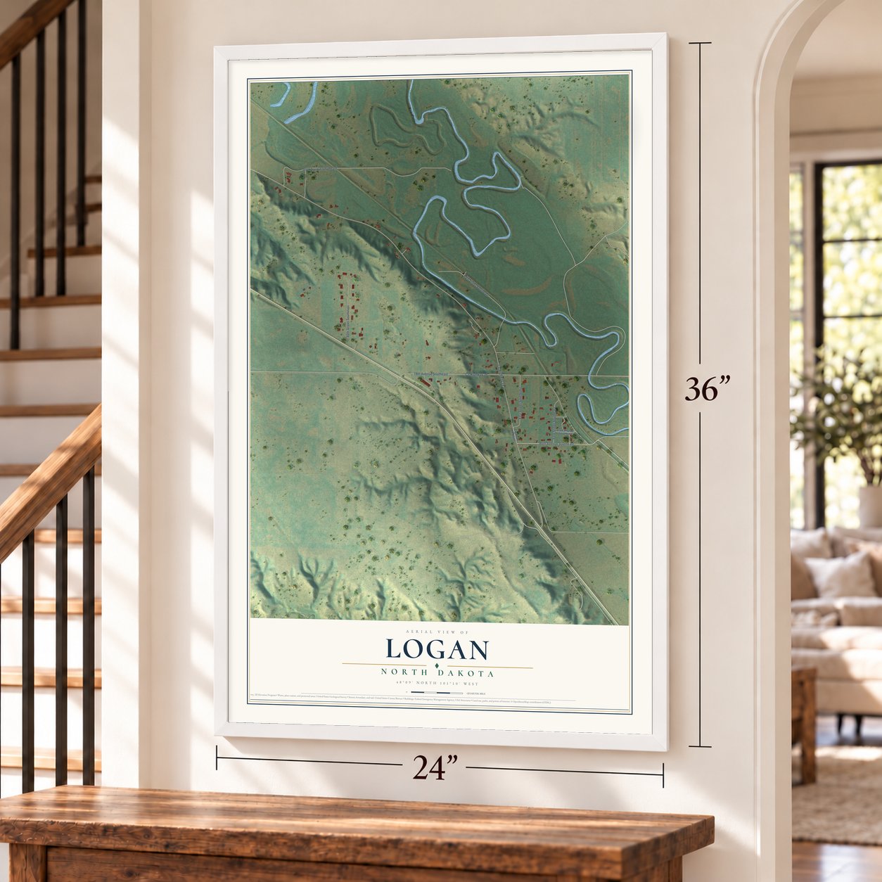Logan, North Dakota map, 24 x 36 inch print in a white frame by a staircase