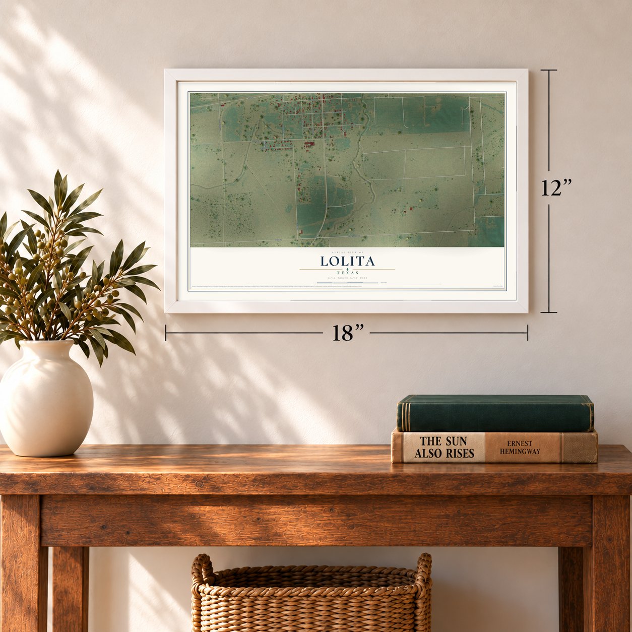 Lolita, Texas map, 12 x 18 inch print in a white frame in an entryway