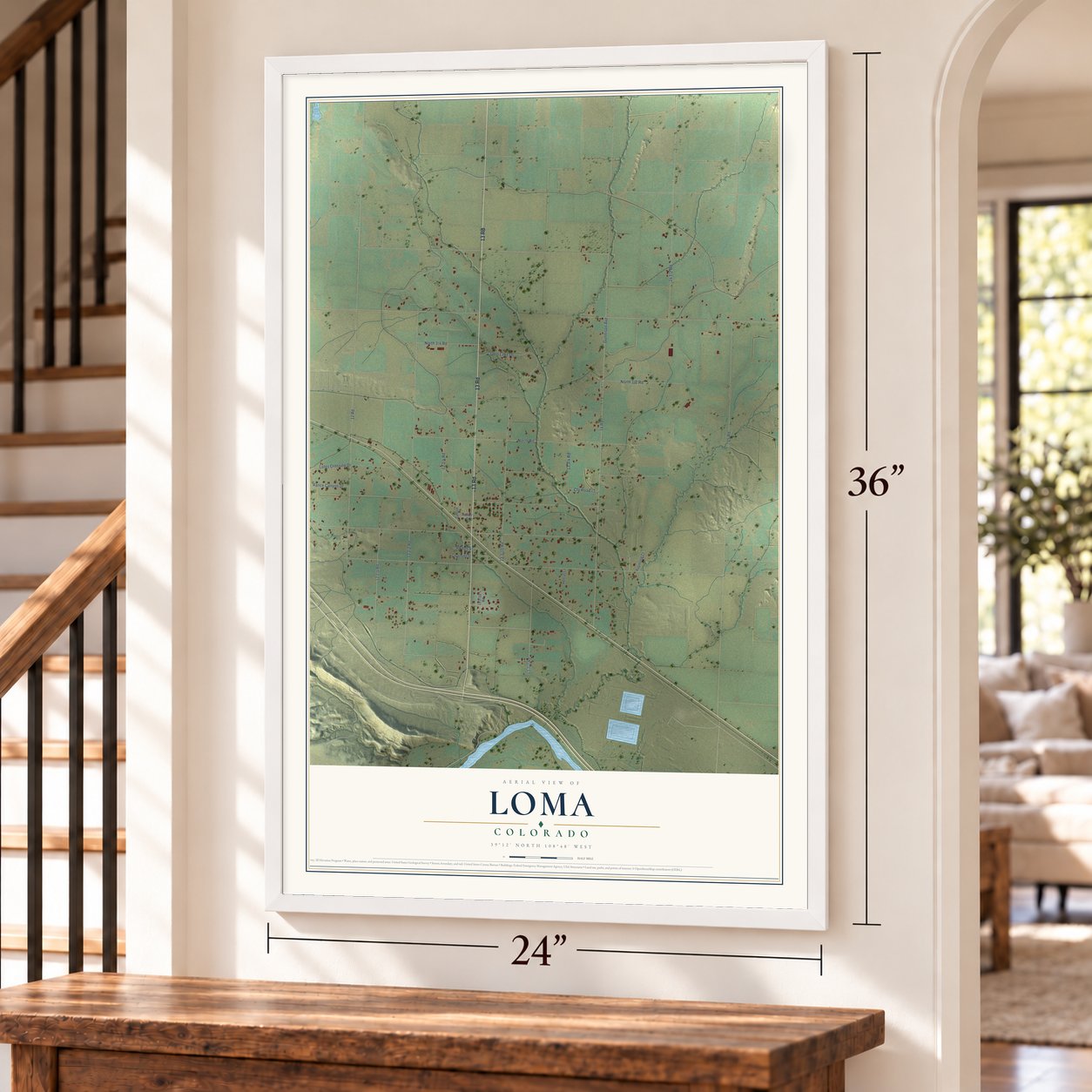 Loma, Colorado map, 24 x 36 inch print in a white frame by a staircase
