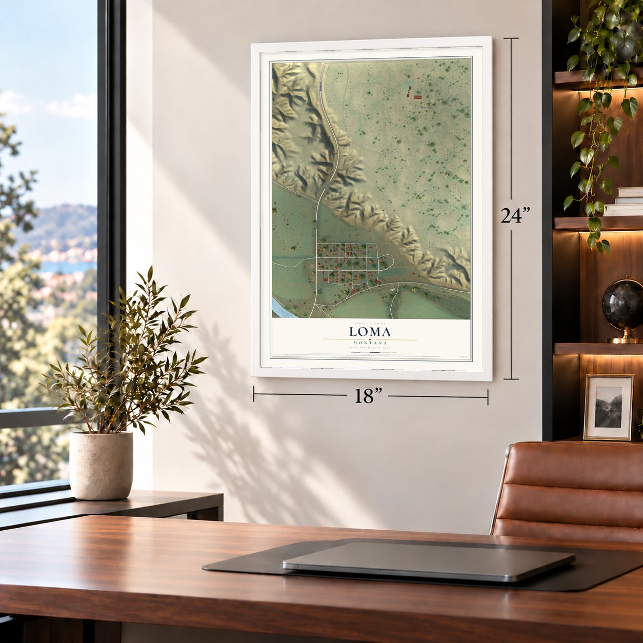 Loma, Montana map, 18 x 24 inch print in a white frame in a home office