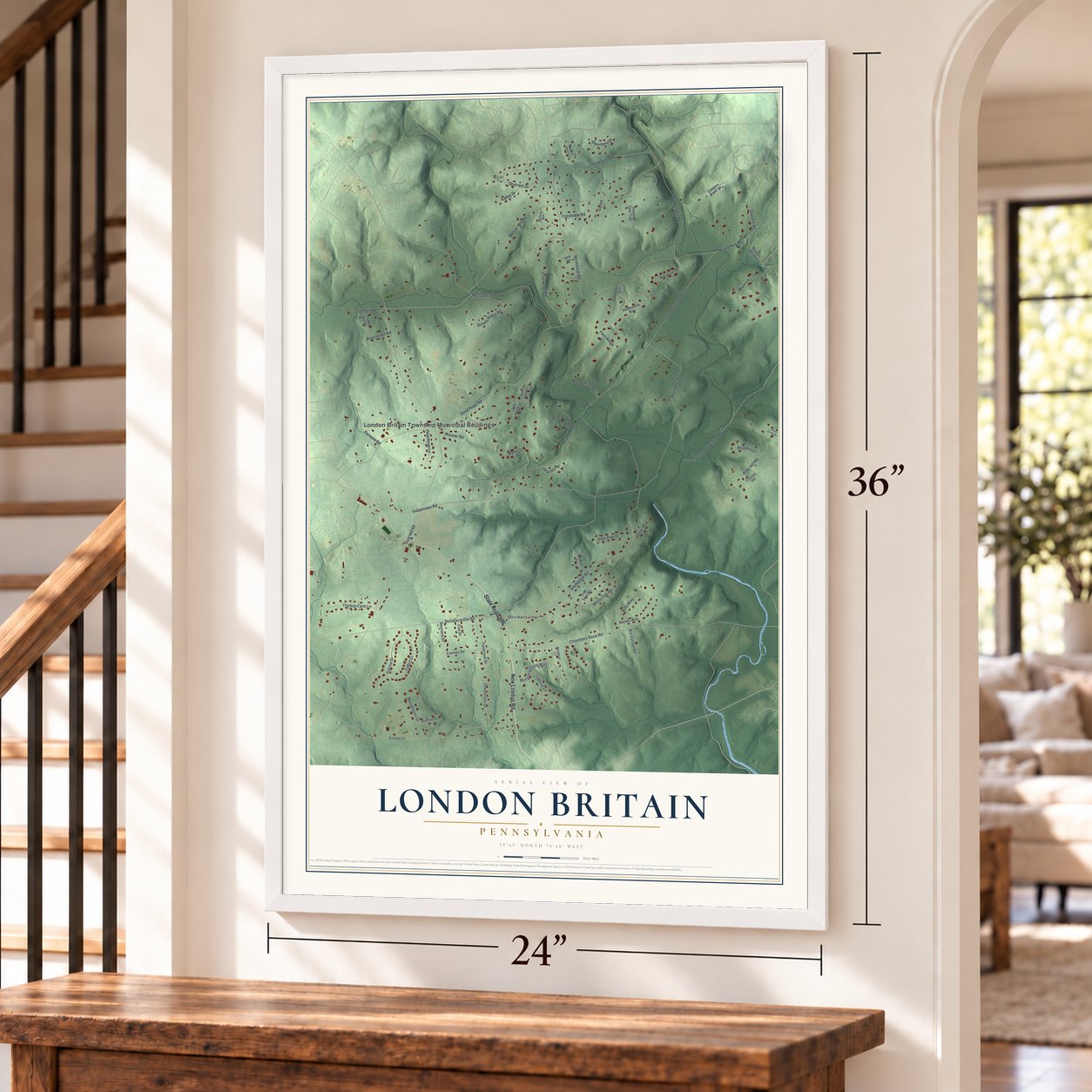 London Britain, Pennsylvania map, 24 x 36 inch print in a white frame by a staircase