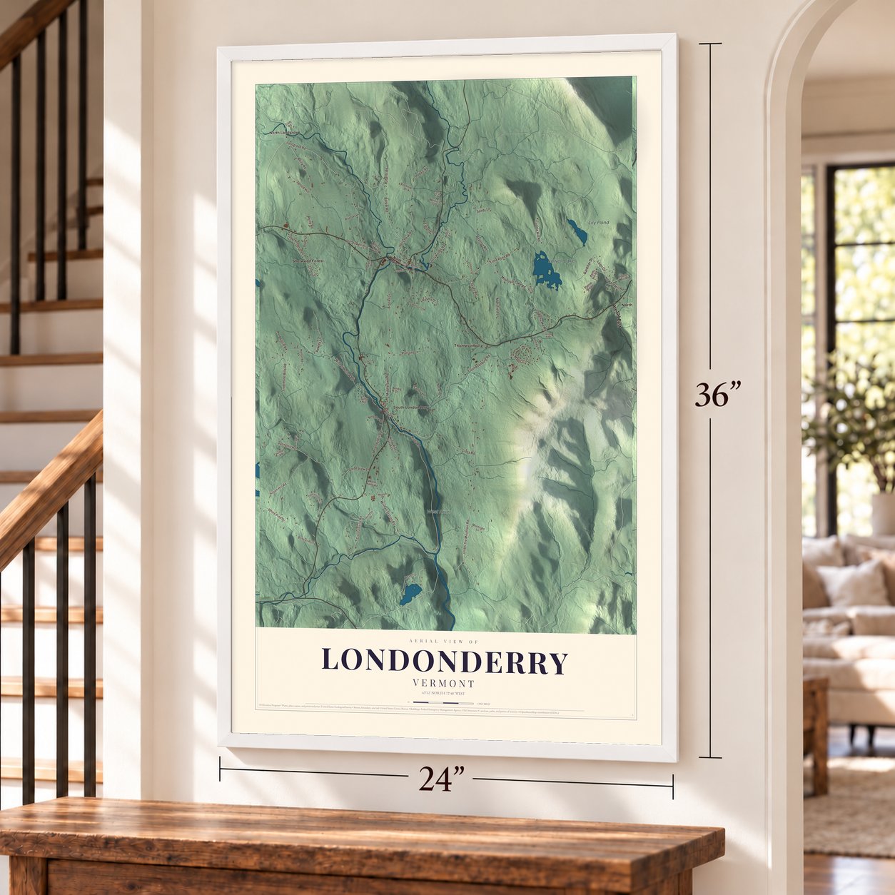 Londonderry, Vermont map, 24 x 36 inch print in a white frame by a staircase