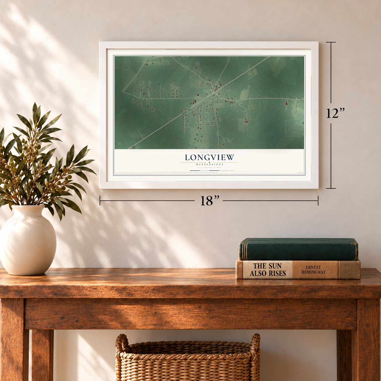 Longview, Mississippi map, 12 x 18 inch print in a white frame in an entryway