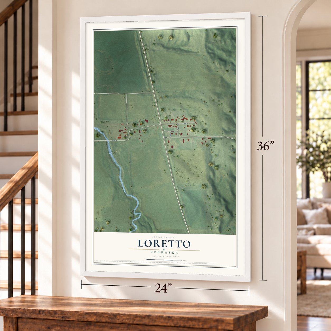 Loretto, Nebraska map, 24 x 36 inch print in a white frame by a staircase