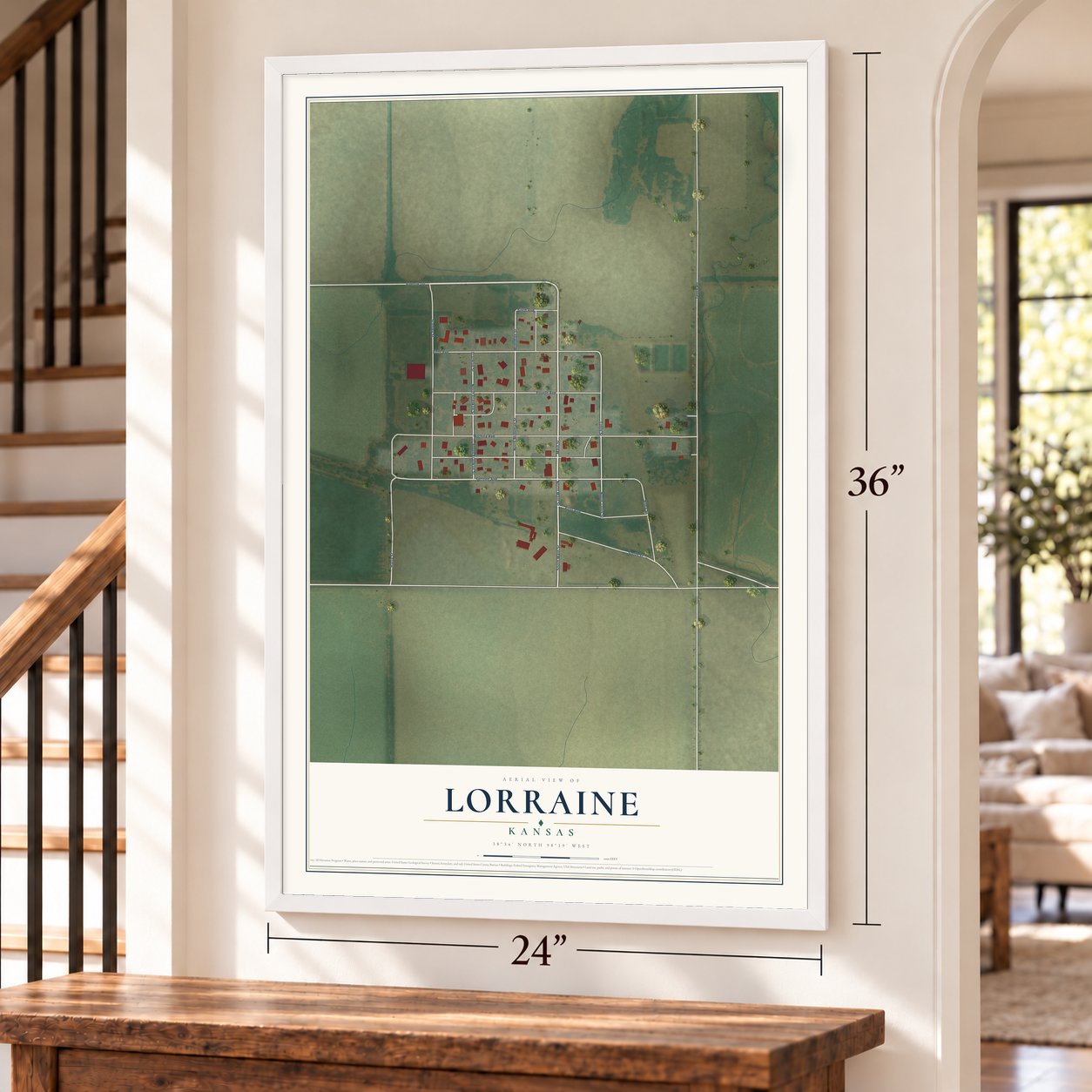 Lorraine, Kansas map, 24 x 36 inch print in a white frame by a staircase