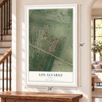 Los Alvarez, Texas map, 24 x 36 inch print in a white frame by a staircase