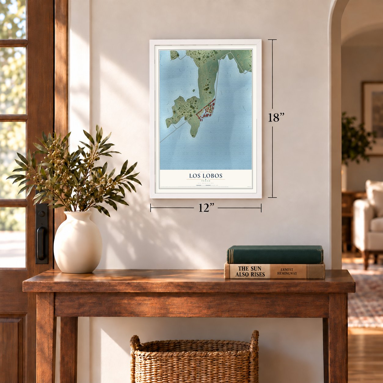 Los Lobos, Texas map, 12 x 18 inch print in a white frame in an entryway