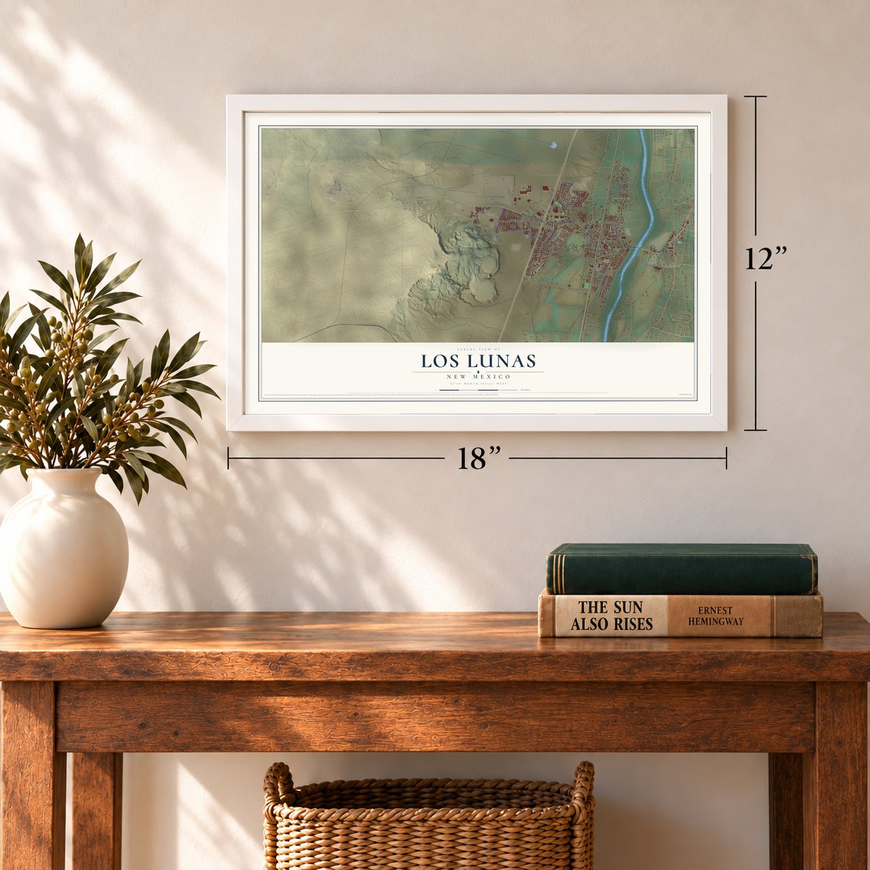 Los Lunas, New Mexico map, 12 x 18 inch print in a white frame in an entryway