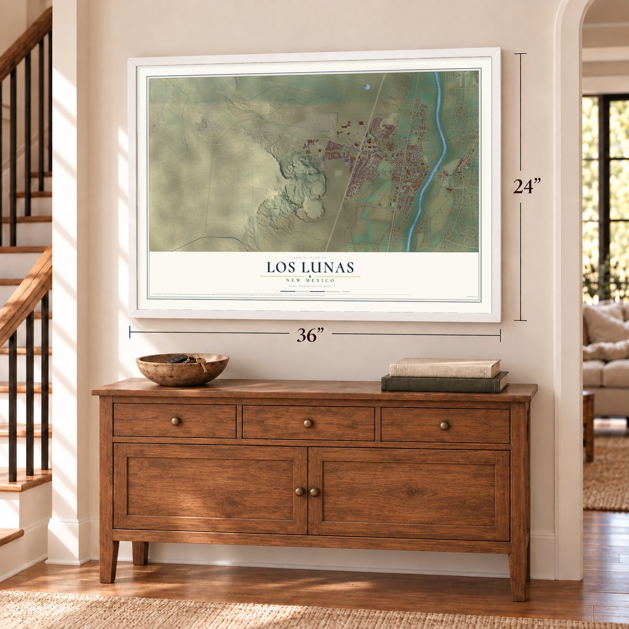 Los Lunas, New Mexico map, 24 x 36 inch print in a white frame above a dresser by a staircase