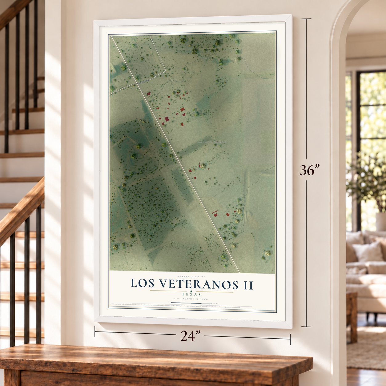 Los Veteranos II, Texas map, 24 x 36 inch print in a white frame by a staircase