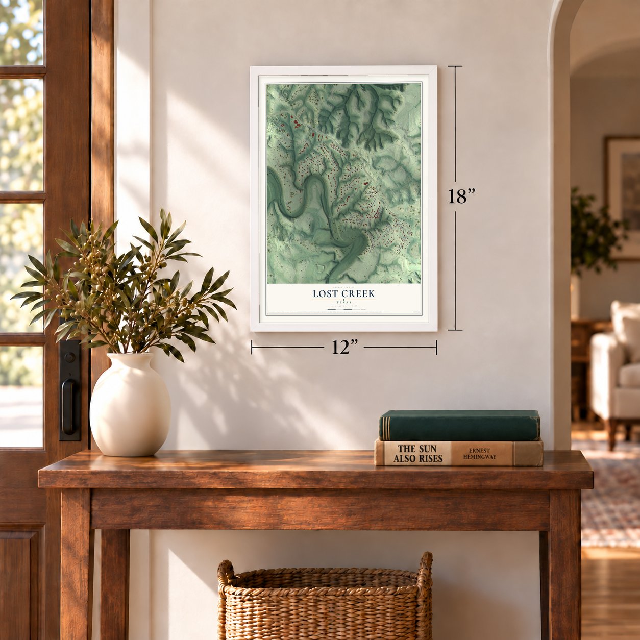 Lost Creek, Texas map, 12 x 18 inch print in a white frame in an entryway