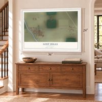 Lost Hills, California map, 24 x 36 inch print in a white frame above a dresser by a staircase