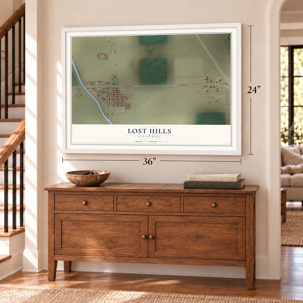 Lost Hills, California map, 24 x 36 inch print in a white frame above a dresser by a staircase