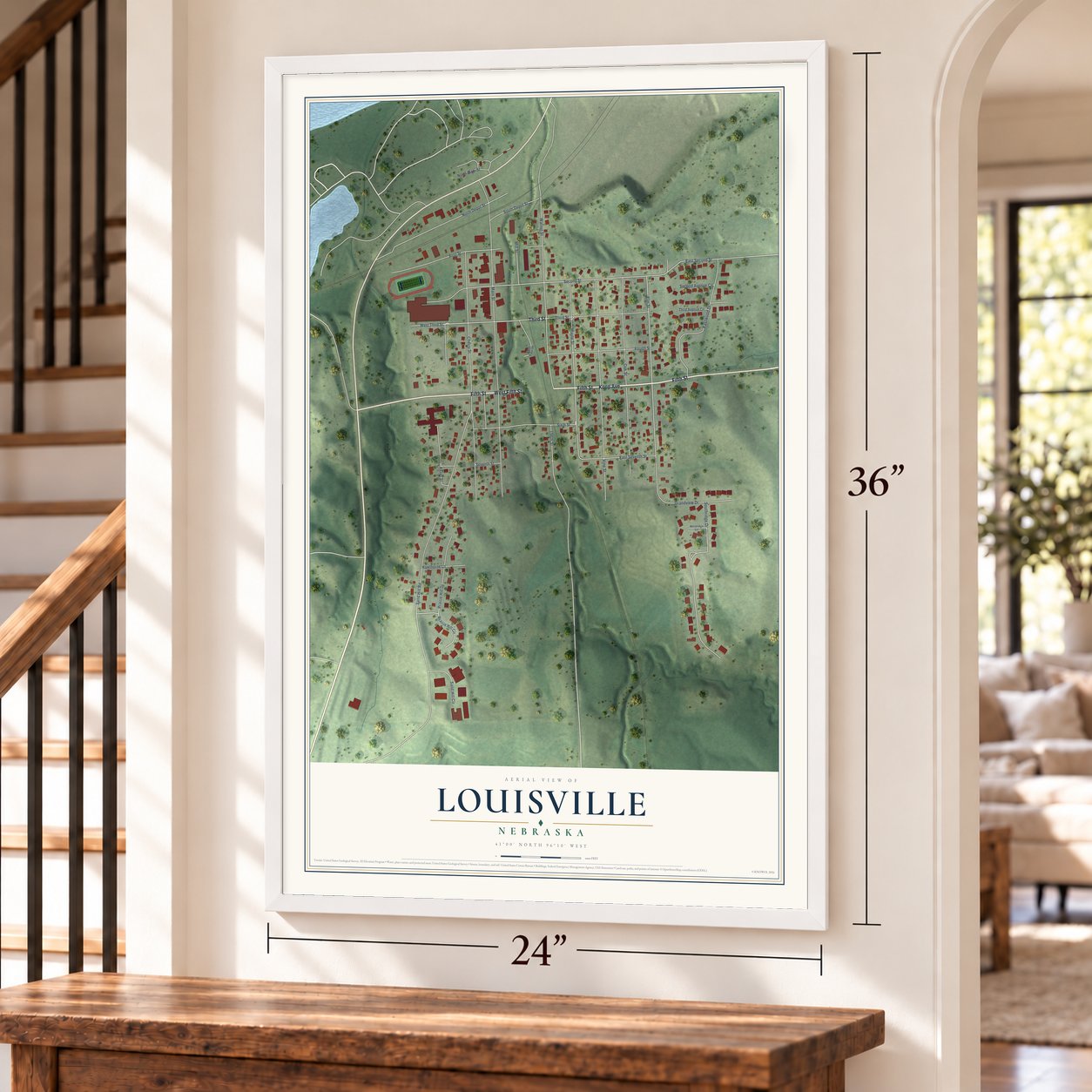 Louisville, Nebraska map, 24 x 36 inch print in a white frame by a staircase
