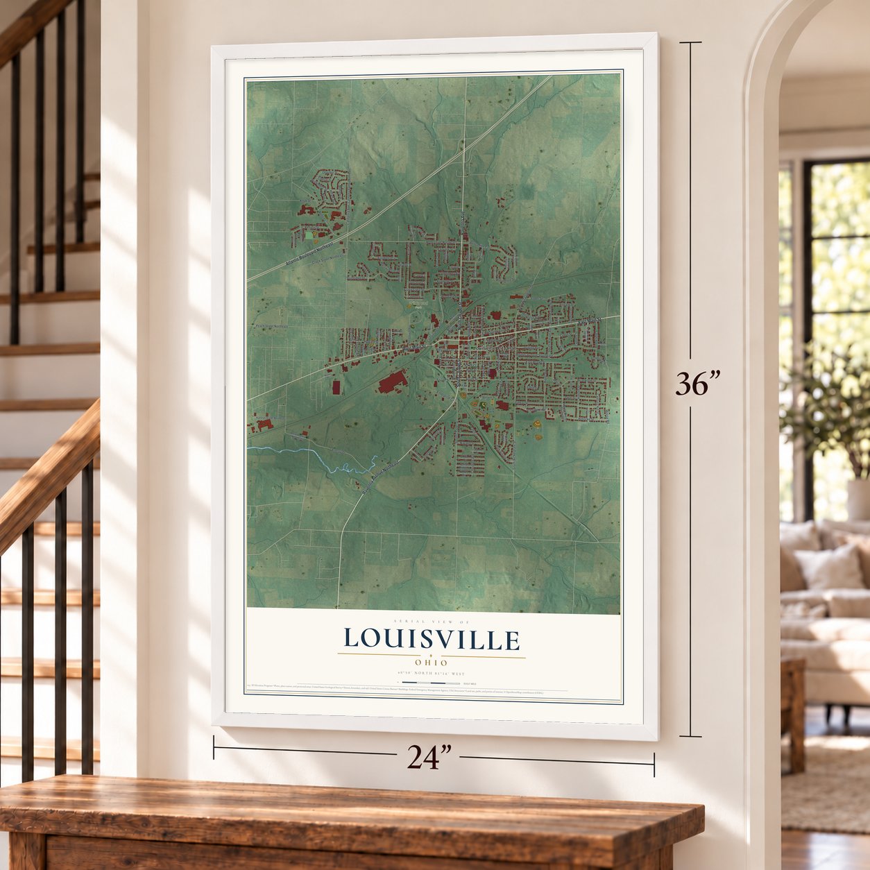 Louisville, Ohio map, 24 x 36 inch print in a white frame by a staircase