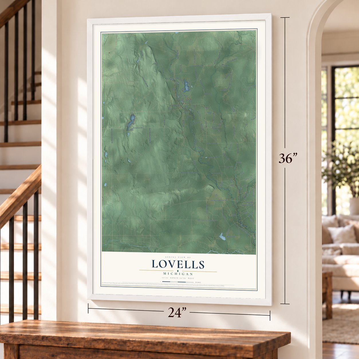 Lovells, Michigan map, 24 x 36 inch print in a white frame by a staircase