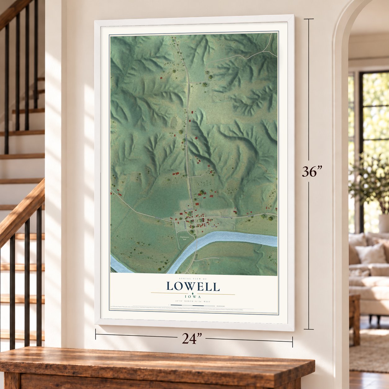 Lowell, Iowa map, 24 x 36 inch print in a white frame by a staircase