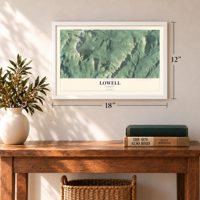 Lowell, Vermont map, 12 x 18 inch print in a white frame in an entryway
