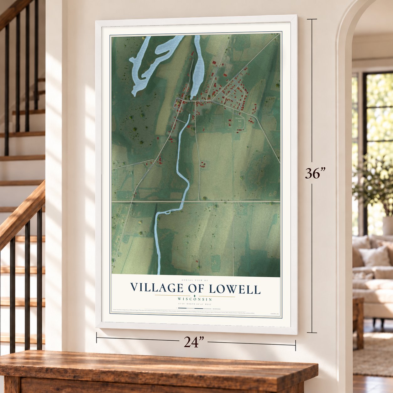 Lowell, Wisconsin map, 24 x 36 inch print in a white frame by a staircase