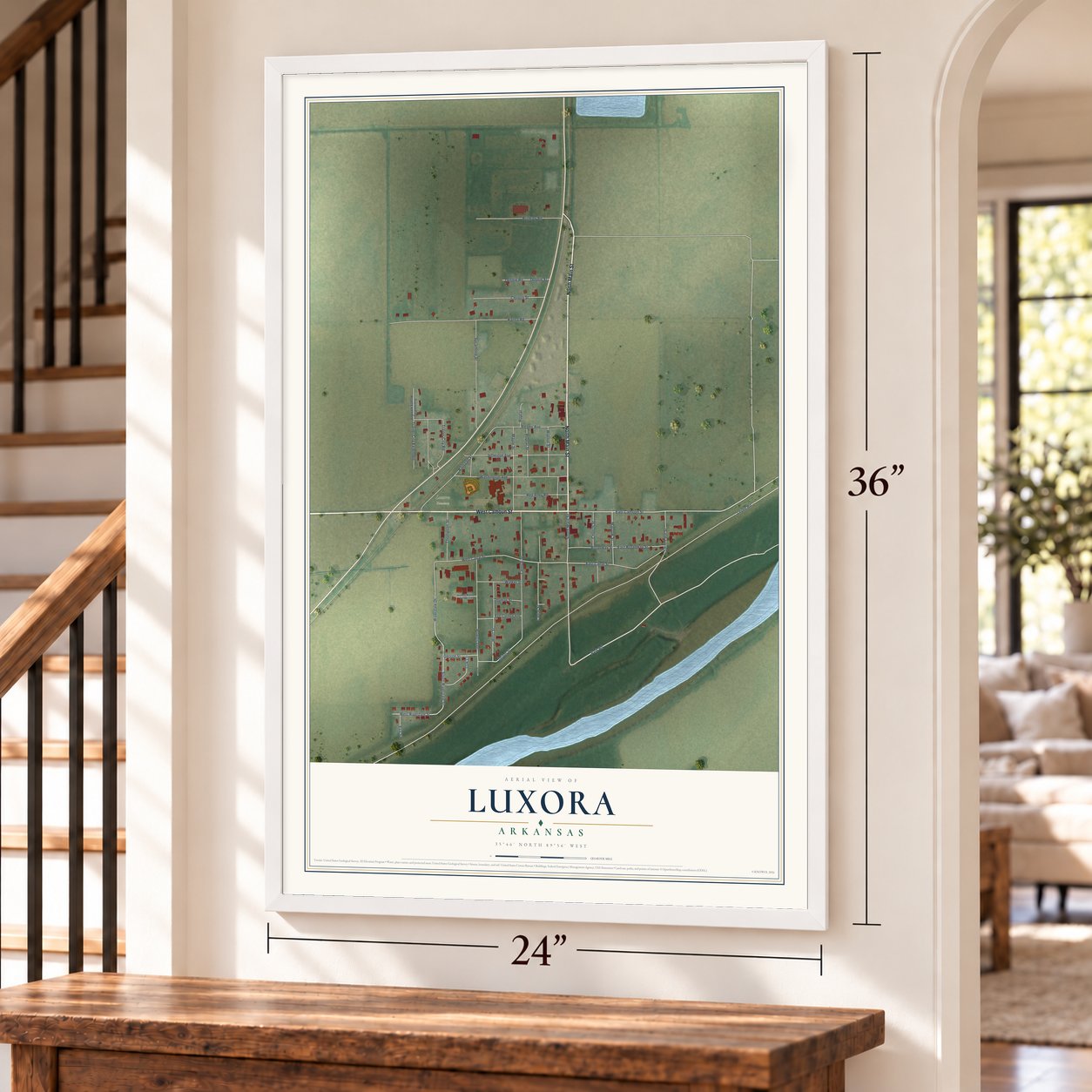 Luxora, Arkansas map, 24 x 36 inch print in a white frame by a staircase