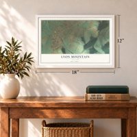 Lyon Mountain, New York map, 12 x 18 inch print in a white frame in an entryway