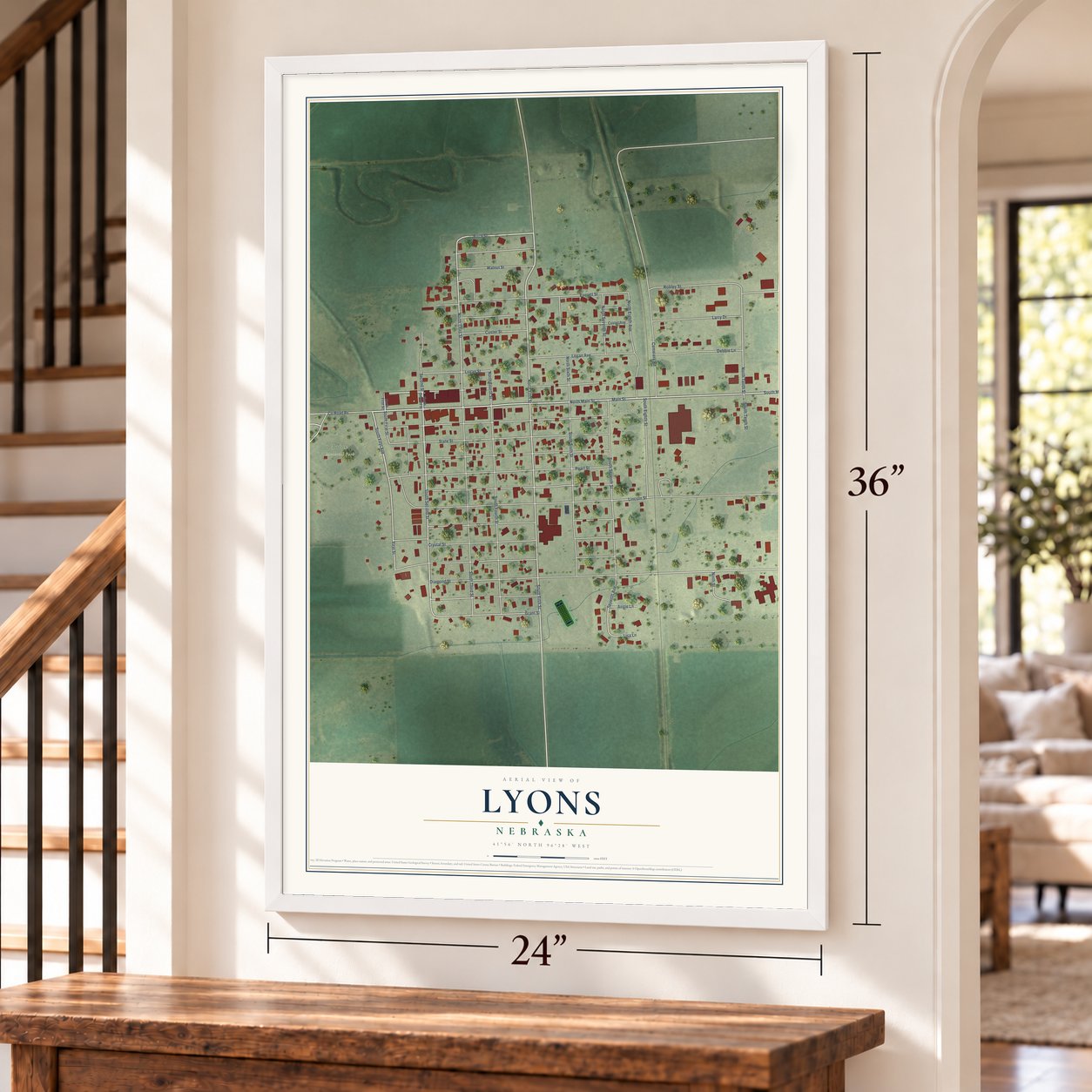 Lyons, Nebraska map, 24 x 36 inch print in a white frame by a staircase