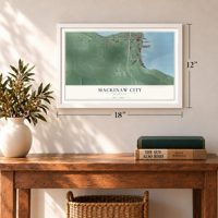 Mackinaw City, Michigan map, 12 x 18 inch print in a white frame in an entryway