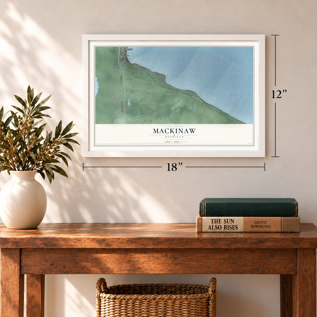 Mackinaw, Michigan map, 12 x 18 inch print in a white frame in an entryway