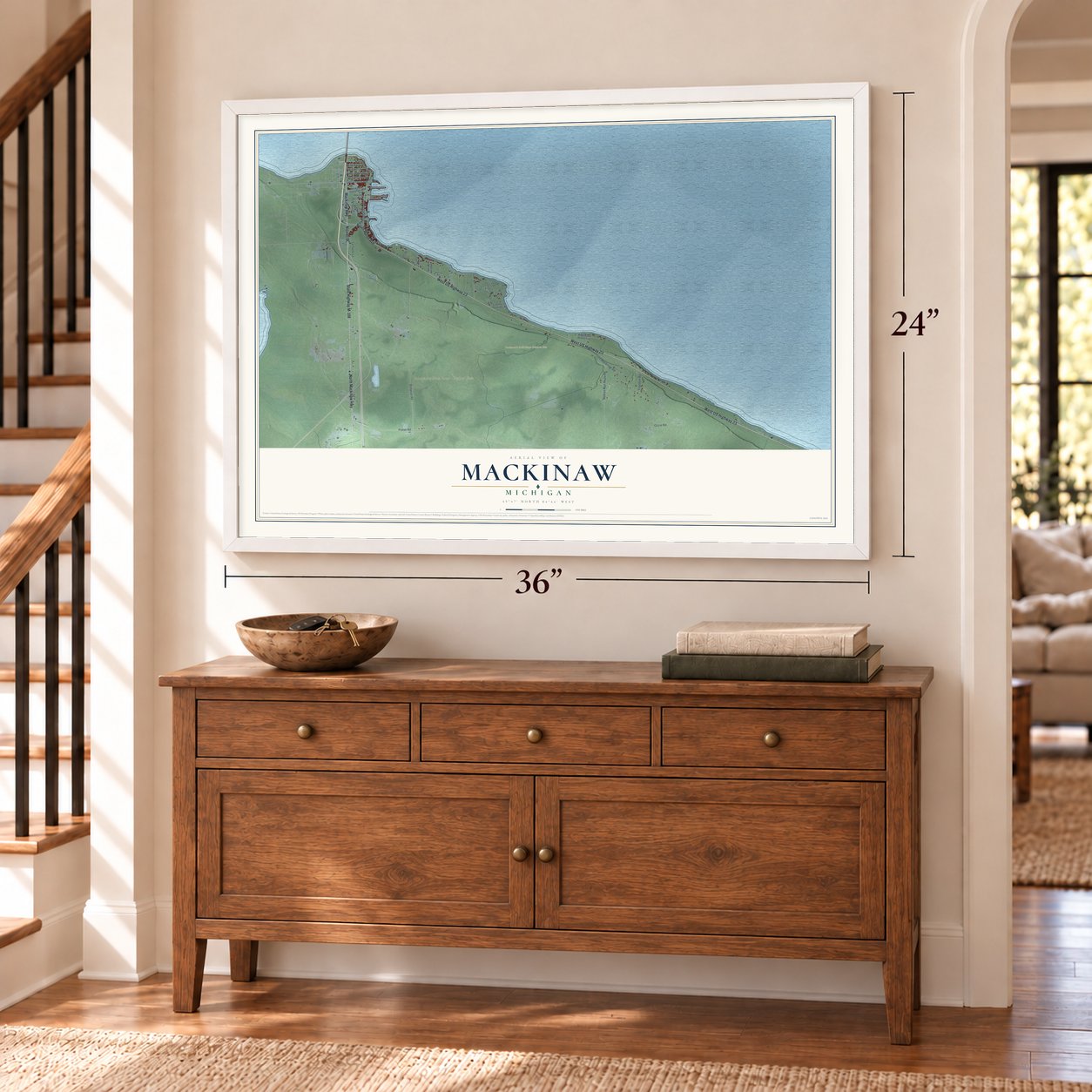 Mackinaw, Michigan map, 24 x 36 inch print in a white frame above a dresser by a staircase