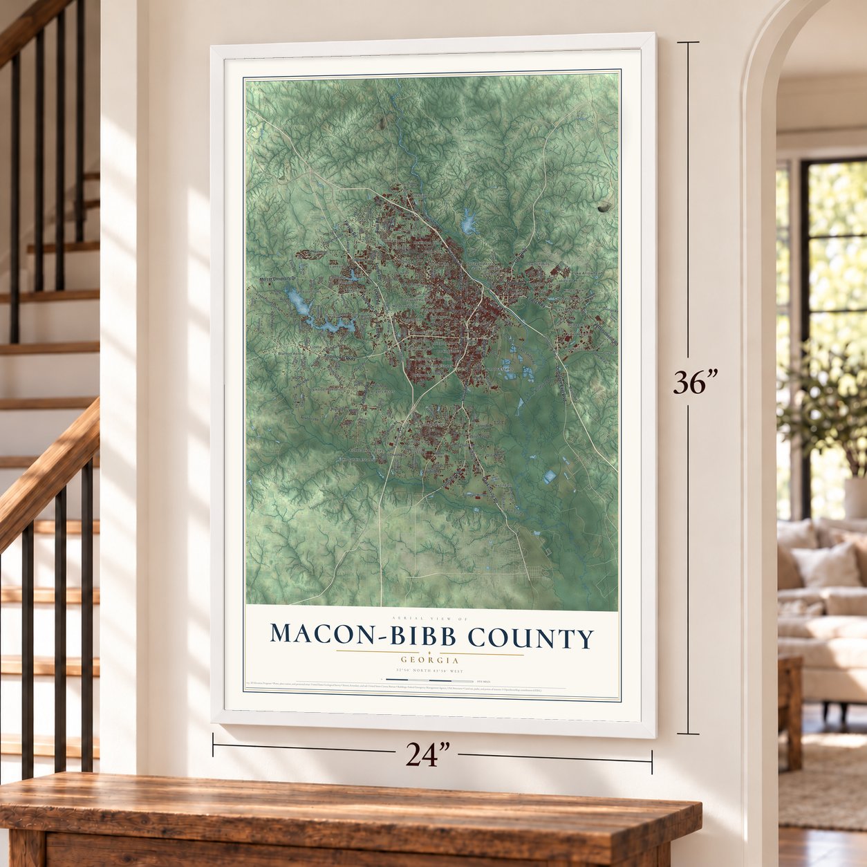Macon-Bibb County, Georgia map, 24 x 36 inch print in a white frame by a staircase