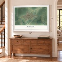 Madelia, Minnesota map, 24 x 36 inch print in a white frame above a dresser by a staircase
