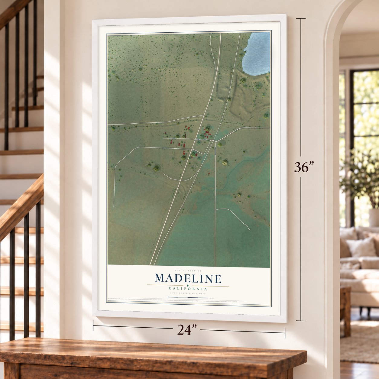 Madeline, California map, 24 x 36 inch print in a white frame by a staircase