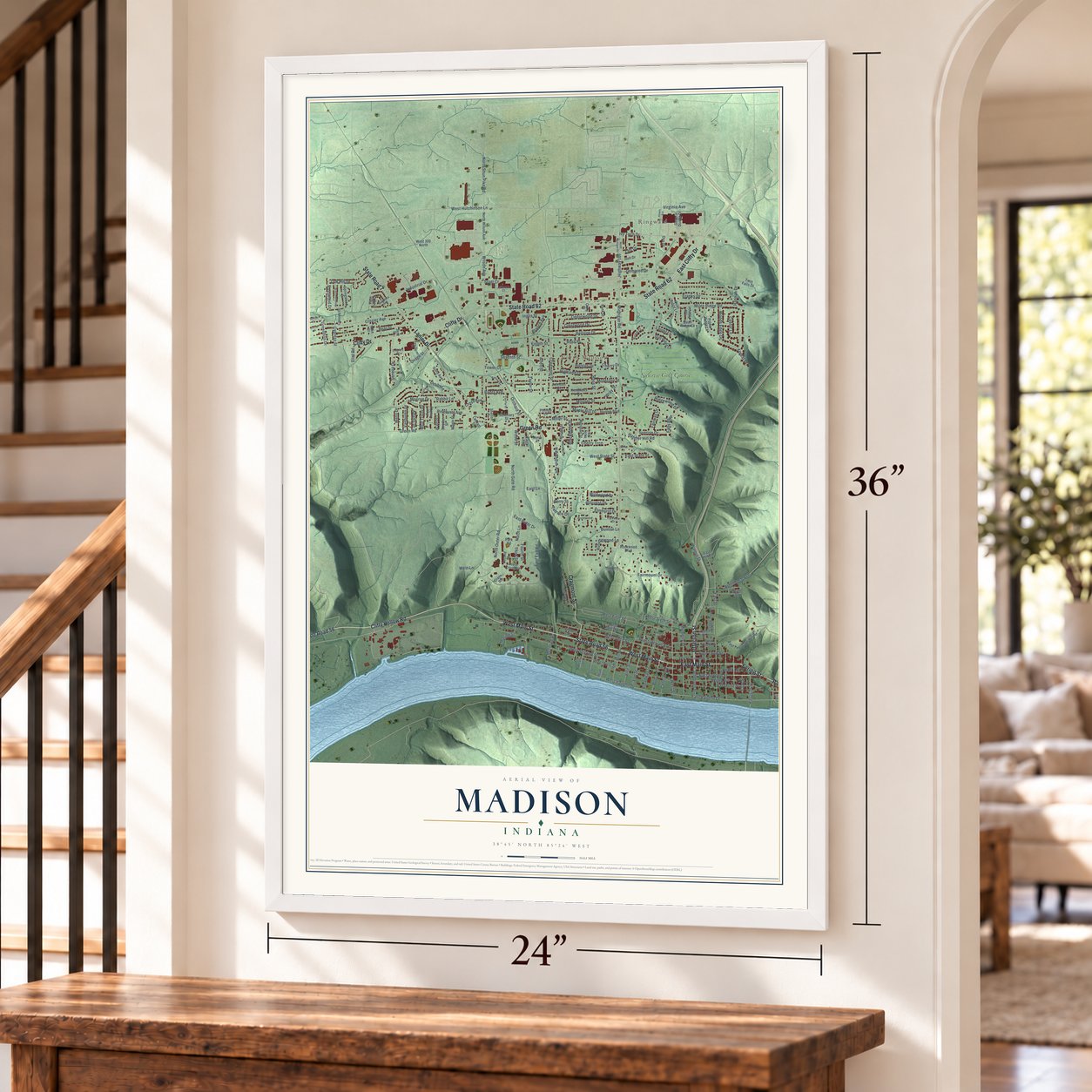 Madison, Indiana map, 24 x 36 inch print in a white frame by a staircase