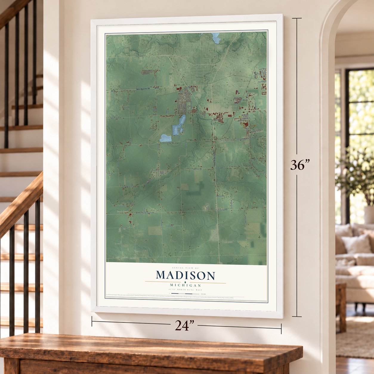 Madison, Michigan map, 24 x 36 inch print in a white frame by a staircase