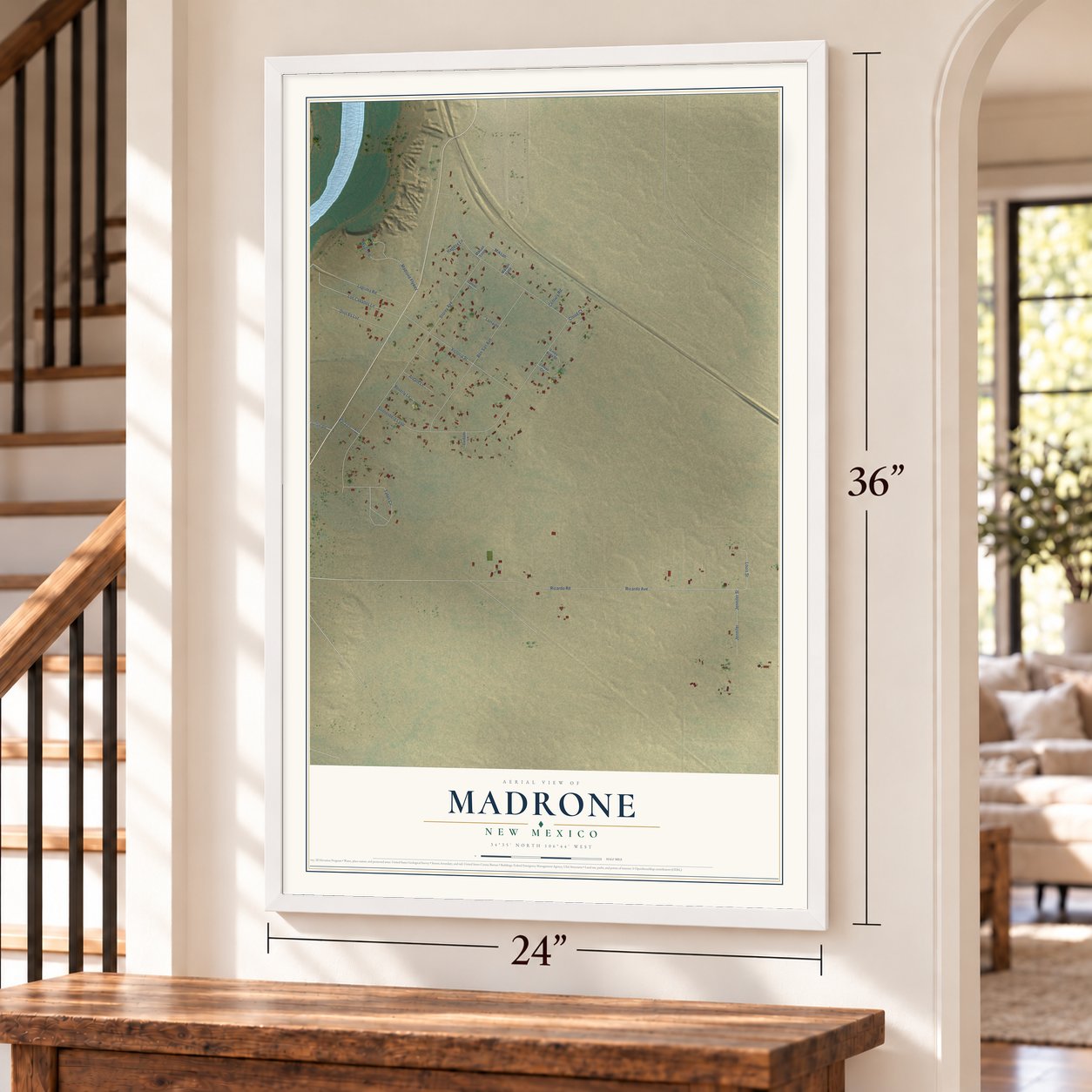Madrone, New Mexico map, 24 x 36 inch print in a white frame by a staircase