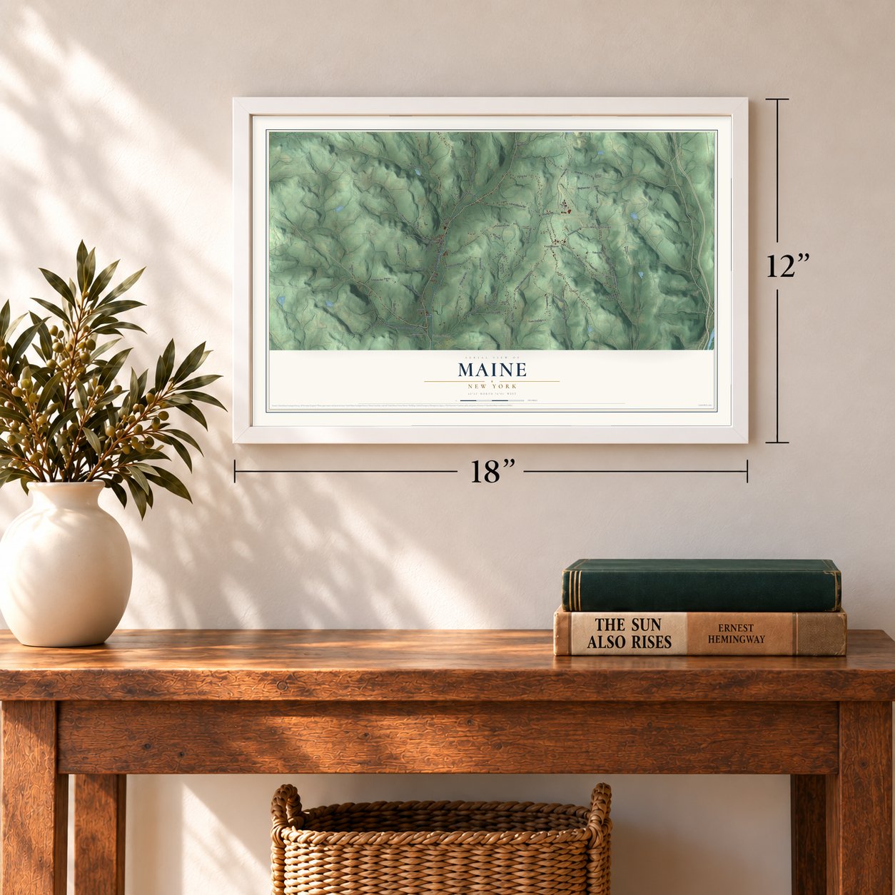 Maine, New York map, 12 x 18 inch print in a white frame in an entryway