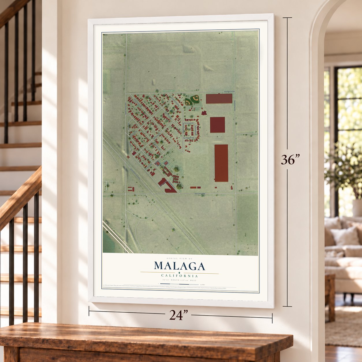 Malaga, California map, 24 x 36 inch print in a white frame by a staircase