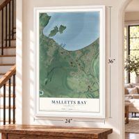 Malletts Bay, Vermont map, 24 x 36 inch print in a white frame by a staircase