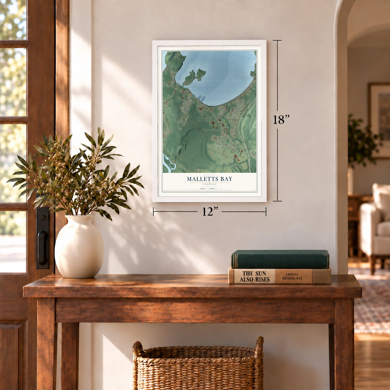 Malletts Bay, Vermont map, 12 x 18 inch print in a white frame in an entryway