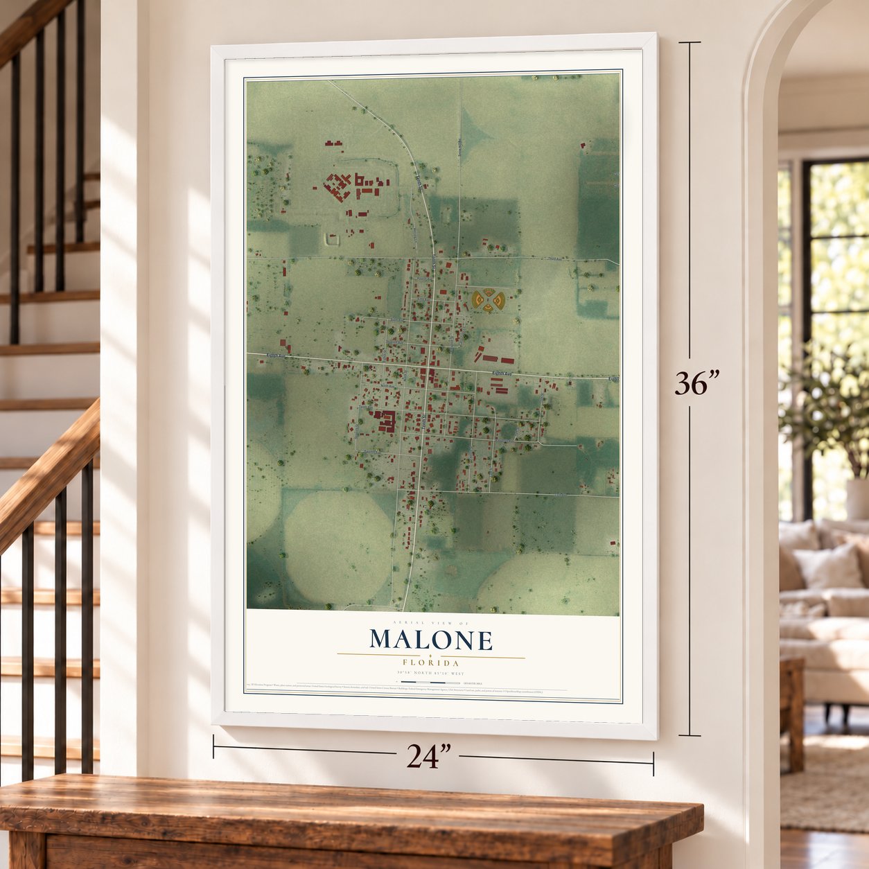 Malone, Florida map, 24 x 36 inch print in a white frame by a staircase