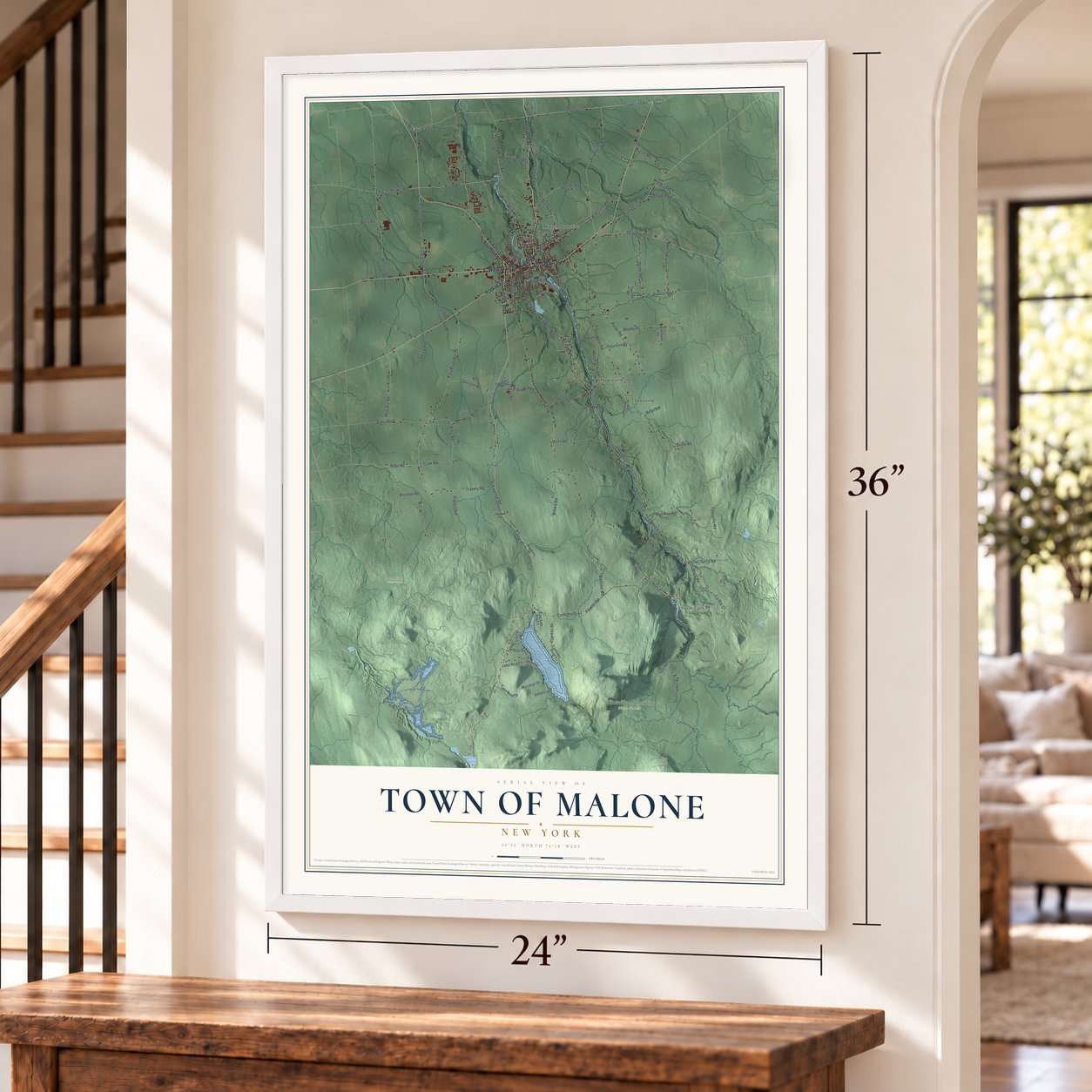 Town of Malone, New York map, 24 x 36 inch print in a white frame by a staircase