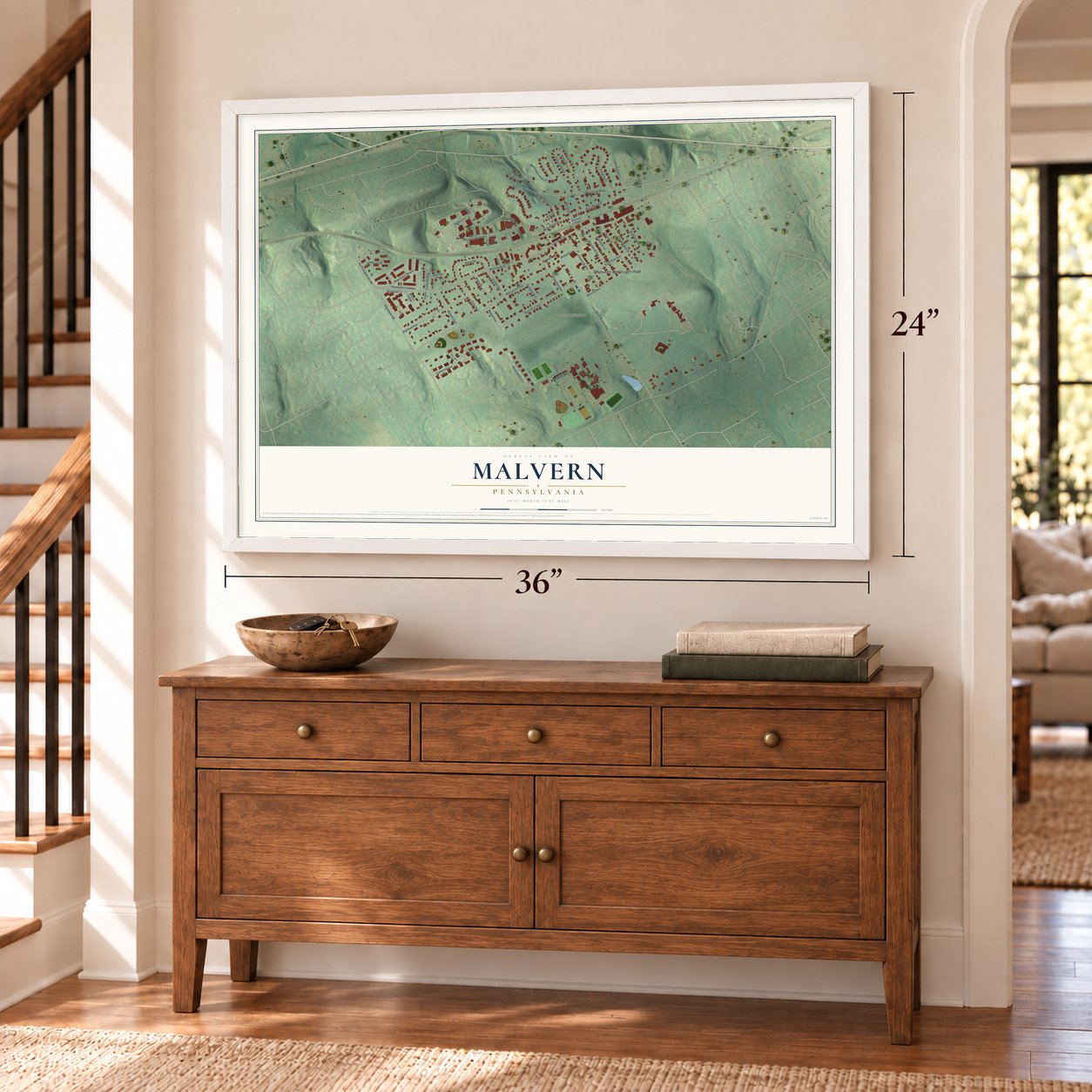 Malvern, Pennsylvania map, 24 x 36 inch print in a white frame above a dresser by a staircase