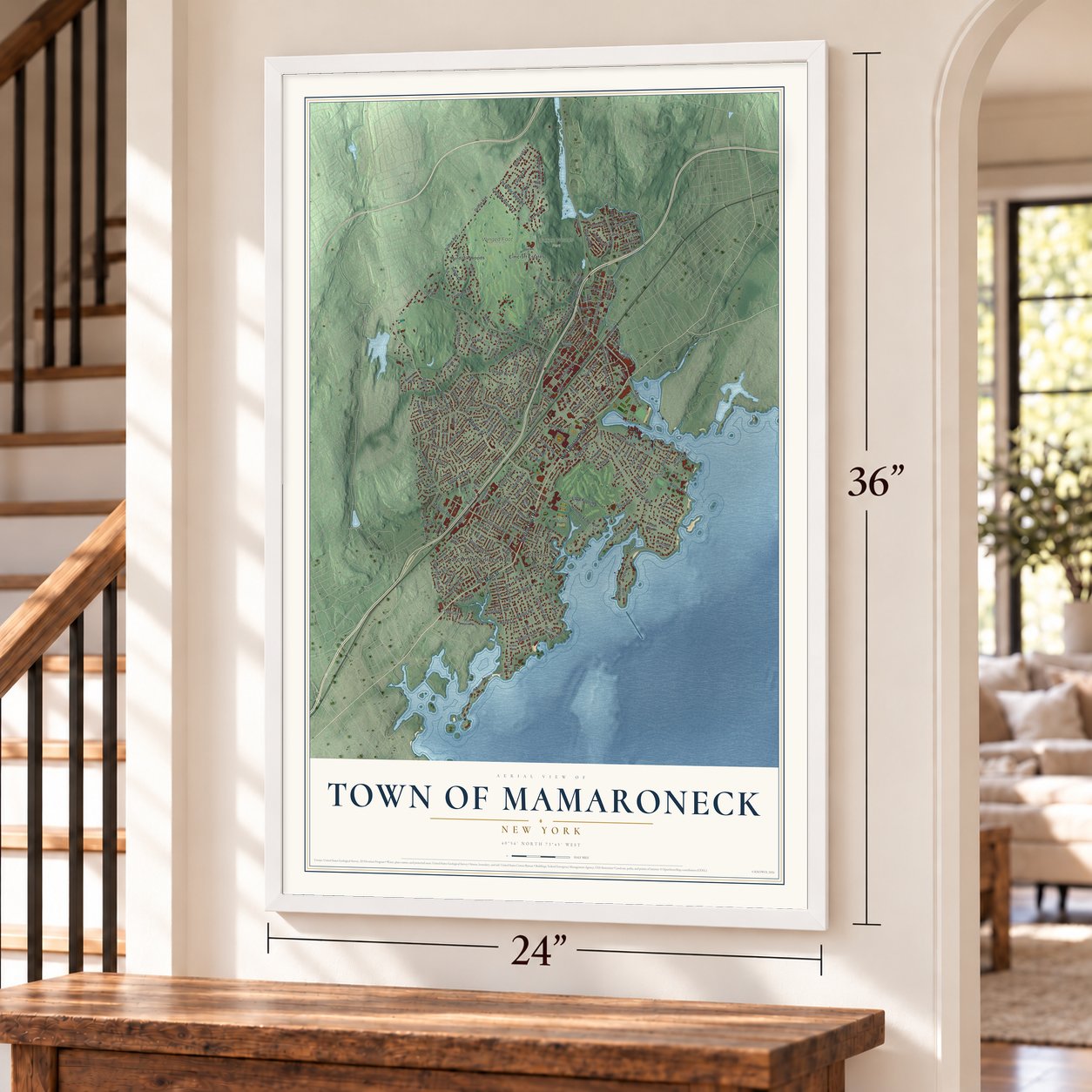 Town of Mamaroneck, New York map, 24 x 36 inch print in a white frame by a staircase