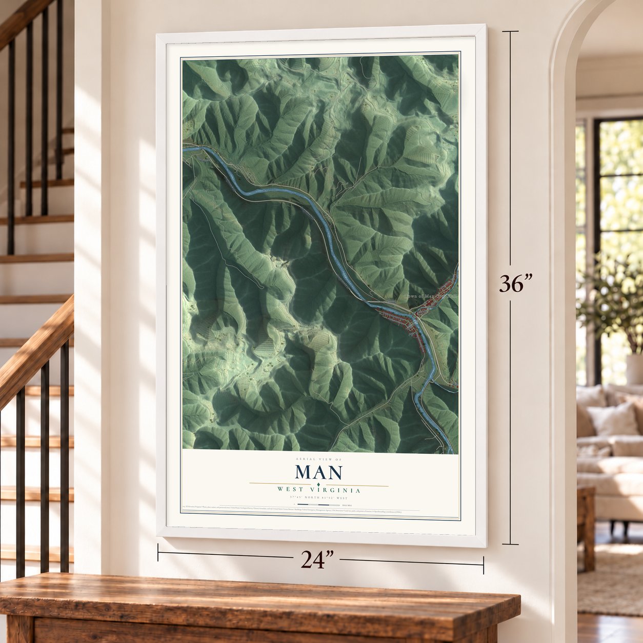 Man, West Virginia map, 24 x 36 inch print in a white frame by a staircase