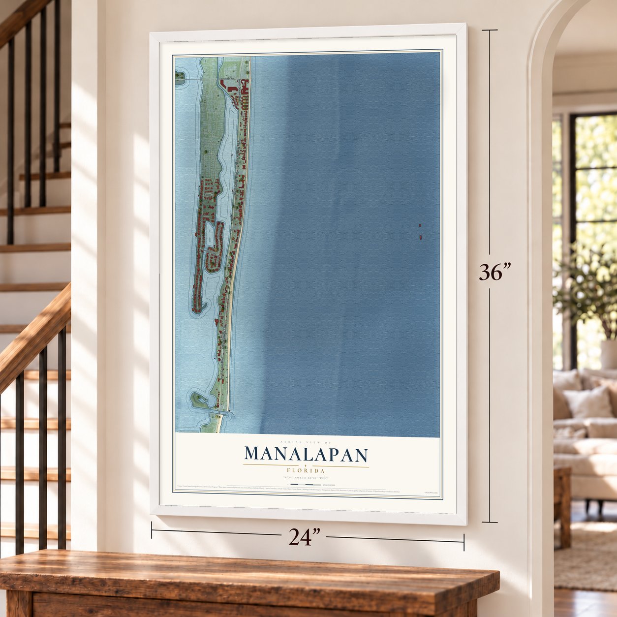 Manalapan, Florida map, 24 x 36 inch print in a white frame by a staircase