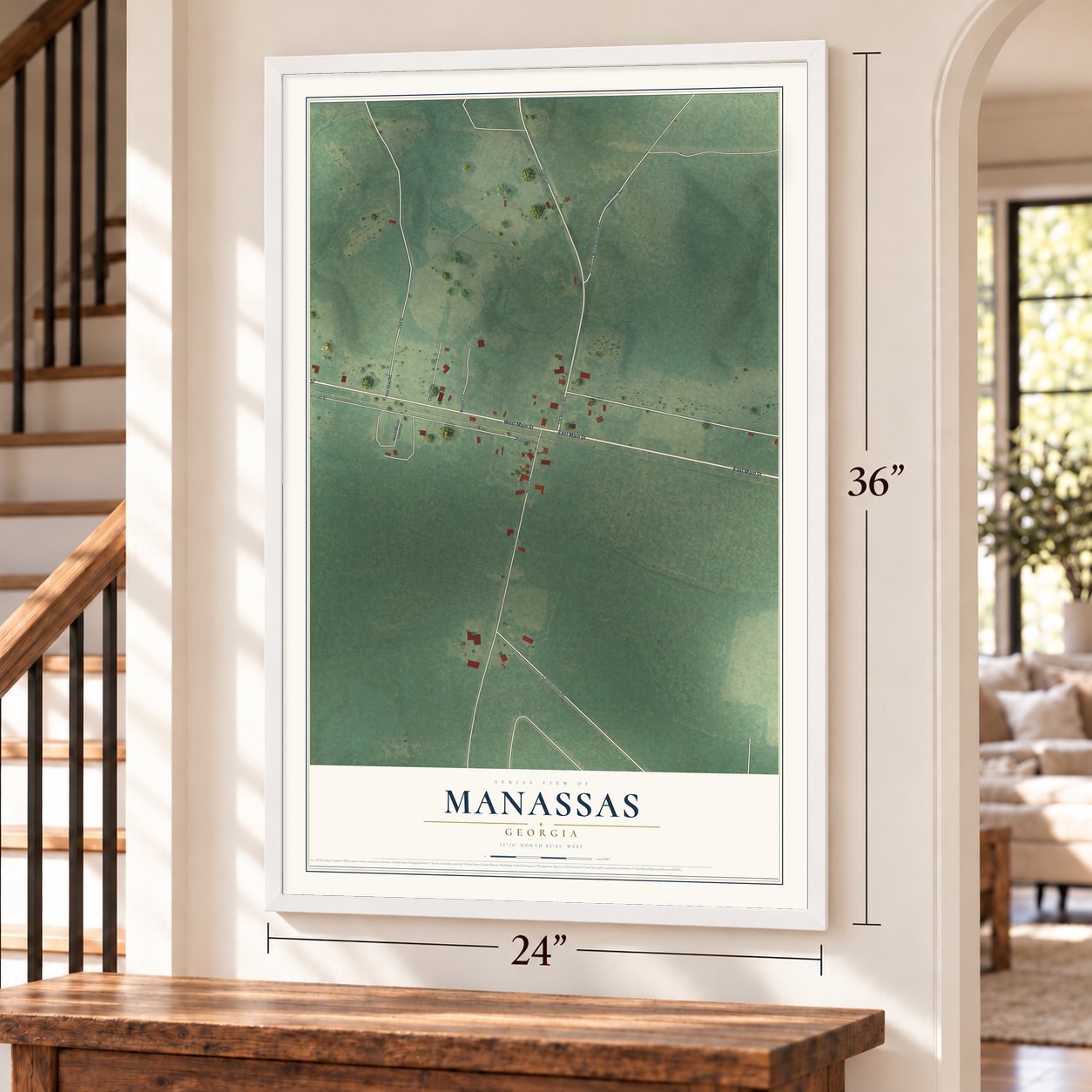 Manassas, Georgia map, 24 x 36 inch print in a white frame by a staircase