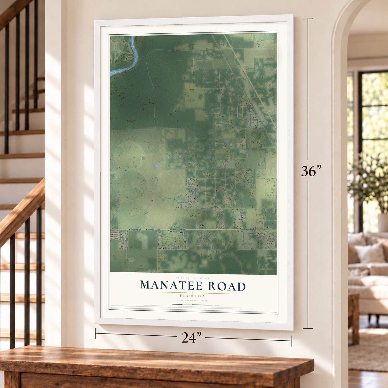 Manatee Road, Florida map, 24 x 36 inch print in a white frame by a staircase
