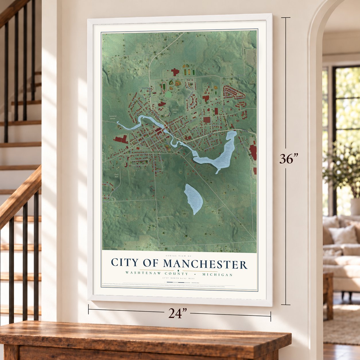 Manchester, Michigan map, 24 x 36 inch print in a white frame by a staircase