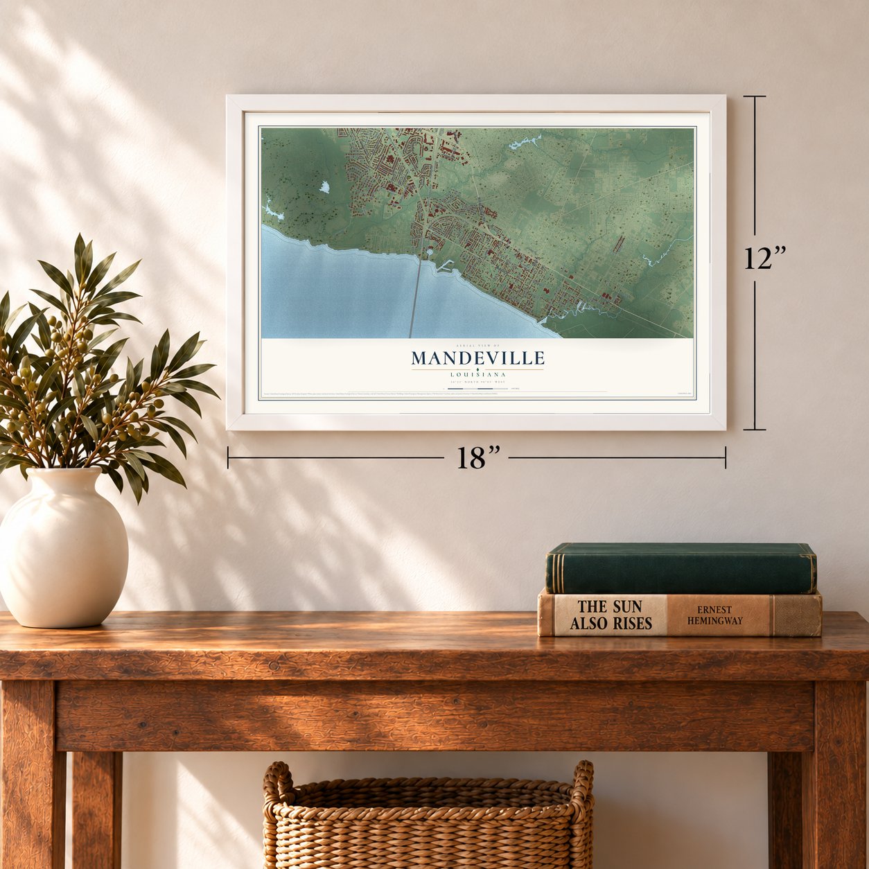 Mandeville, Louisiana map, 12 x 18 inch print in a white frame in an entryway